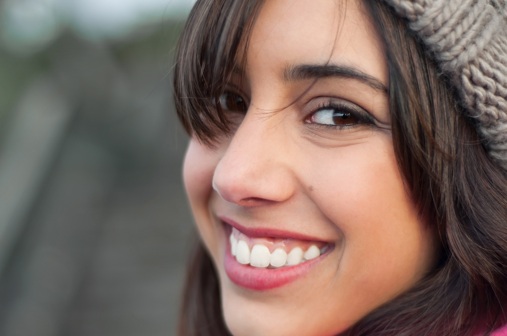 Woman with healthy, bright smile in Royal Oak MI